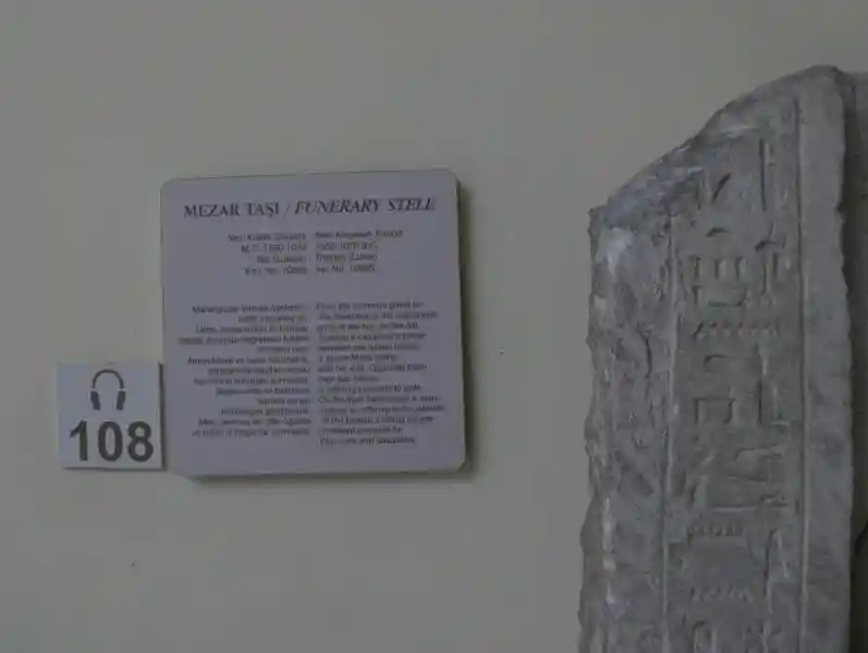 Six-pointed, asymmetrical cross engraved on a funerary stele.